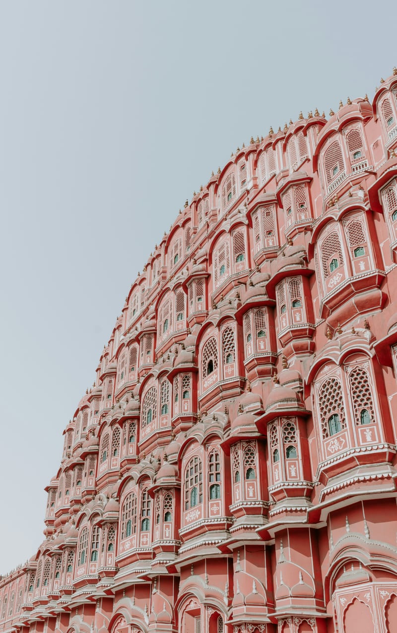 Hawa Mahal pink honeycomb facade close-up — the iconic curved five-storey Palace of Winds
